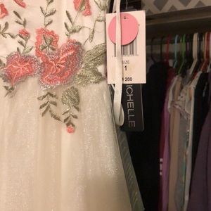 Wedding or prom dresses still has tag